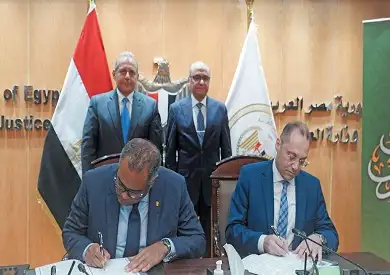 بروتوكول تعاون بين «الأهلى المصرى» ووزارة العدل بهدف تطوير خدمات مصلحة الشهر العقارى والتوثيق