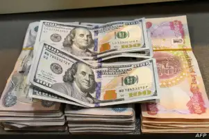 المركزي العراقي يستبعد تغيير سعر صرف الدولار أمام الدينار