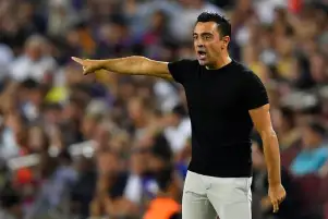 لابورتا يطالب جماهير برشلونة بدعم تشافي والفريق