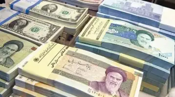 إقالة نائب محافظ البنك المركزي الإيراني مع تراجع الريال لمستوى قياسي