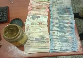 جمارك مطار برج العرب الدولى تضبط محاولة تهريب كمية من النقد المصرى والأجنبي