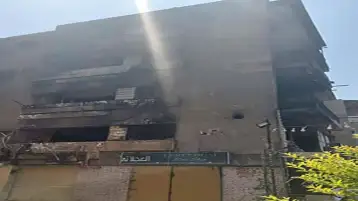 السيطرة على حريق محل أحذية أسفل عقار بإمبابة