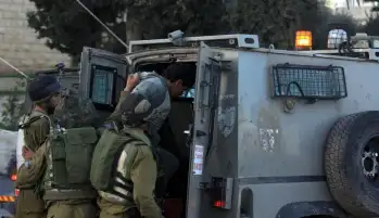 القوات الإسرائيلية تعتقل 20 فلسطينيا على الأقل في الضفة