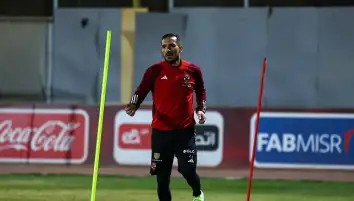 مشاركة علي معلول في تدريبات الأهلي خلال أسبوعين